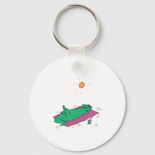 sun tanning crocodile key ring