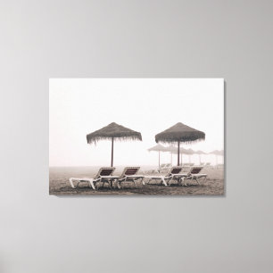 Sunbeds And Umbrella On Playamar Beach Canvas Print
