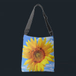 Sunflower and Bees Crossbody Bag<br><div class="desc">Crossbody Bags or Tote Bags with Yellow Sunflower and Bees on Blue Sky - Summer Day - Photo Flower Nature - You can also personalise - Choose / Add Your Unique Photo - Image / Text - Name / Colour / Font / Size / more - Make Your Special Bag...</div>