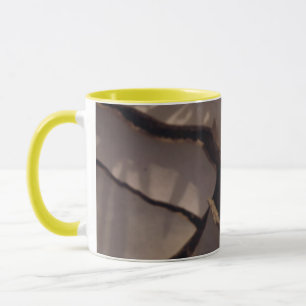 Sunflower growing from Cracked Mud Mug