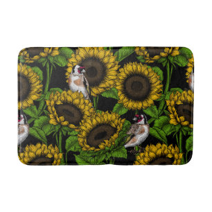 Sunflowers and goldfinches on black bath mat