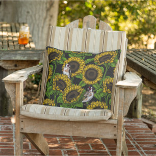 Sunflowers and goldfinches on black cushion