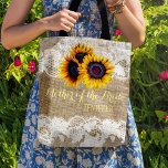 Sunflowers burlap lace wedding mother of the bride tote bag<br><div class="desc">Rustic elegant summer or autumn fall wedding stylish mother of the bride / mother of the groom / bridesmaid / maid of honour / matron of honour / flower girl tote bag on beige faux burlap featuring beautiful yellow gold sunflowers bouquets and white lace borders on both faces. Easy to...</div>