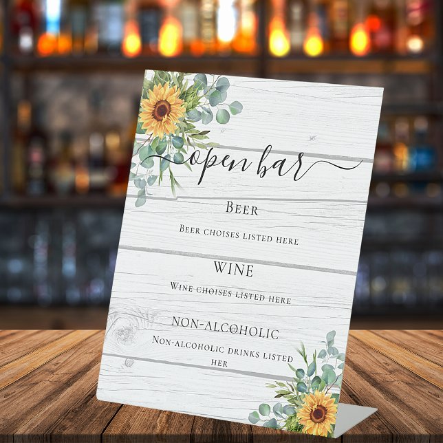 Sunflowers eucalyptus greenery wood bar menu pedestal sign (Creator Uploaded)