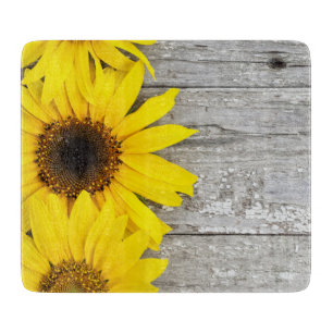 Sunflowers on a table cutting board