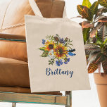 Sunflowers Rustic Watercolor Bridesmaid Name Tote Bag<br><div class="desc">Watercolor boho navy & yellow personalised tote bag featuring a classic white background that can be changed to any colour, a rustic sunflower floral display, feathers, and name. Can be personalised for all the bridal party including the maid of honour, junior bridesmaid, mother of the bride, mother of the groom,...</div>