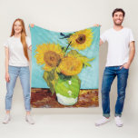 Sunflowers Vincent van Gogh  Fleece Blanket<br><div class="desc">Sunflowers (1888)  Vincent van Gogh. Still life on a blue background. A bright bouquet of sunflower flowers stand in a vase. Reproduction of famous works of art  images in the public domain.</div>