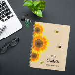 Sunflowers yellow beige bees name  planner<br><div class="desc">Stay organised in style with our Personalised Sunflower and Bee Spiral Planner, featuring a charming design inspired by nature's beauty. Perfect for planning your days with a touch of whimsy, this planner combines functionality with a delightful aesthetic. Warm Beige Background: The soft beige backdrop provides a soothing and neutral canvas,...</div>