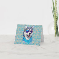 Sunglass-Wearing Husky Dog in Playful Splash