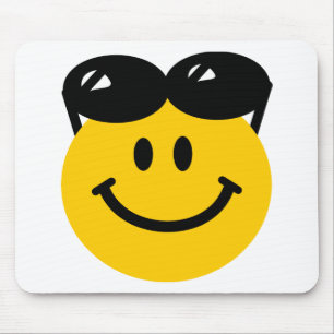 Sunglasses perched on top of head face mouse pad