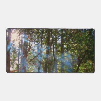 Sunlight Breaking Through the Pines Desk Mat