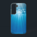Sunlit Coral Reef Tough Phone Case<br><div class="desc">Dive into the breathtaking beauty of a sun-drenched underwater world every time you pick up your phone. This stunning phone case features a vibrant image of brilliant sunbeams piercing through clear blue water, illuminating a thriving coral reef teeming with colourful fish. The unique perspective looking up towards the surface with...</div>