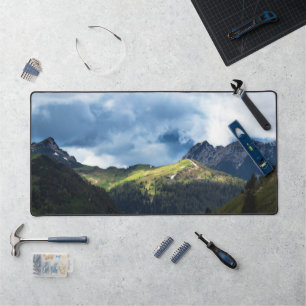 Sunlit field after storm desk mat