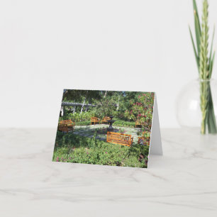 Sunny garden and fountain on a thank you card