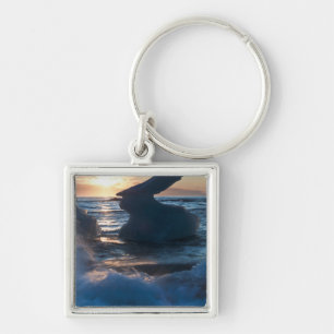 Sunrise and iceberg formation on the beach key ring