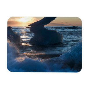 Sunrise and iceberg formation on the beach magnet
