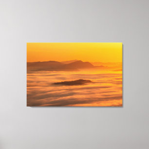 Sunrise colours and clouds canvas print