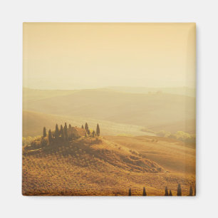 Sunrise over a landscape in Tuscany magnet