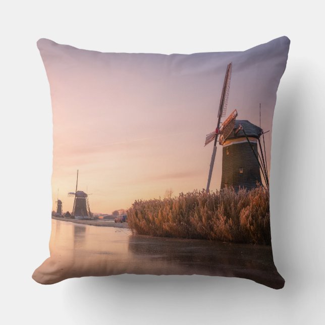 Sunrise over frozen river with windmills and reeds cushion (Front)