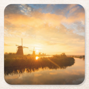 Sunrise over windmills and a river in Holland Square Paper Coaster
