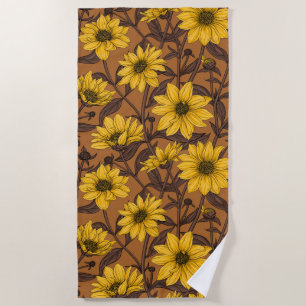 Sunroot, wild sunflower in yellow and brown beach towel