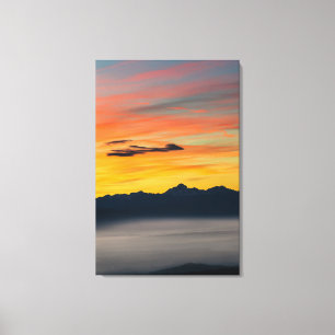 Sunset above Triglav foggy valley Canvas Print