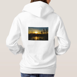 Sunset by a small lake with reed plumes. hoodie