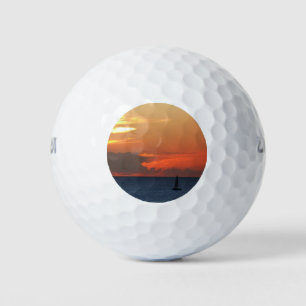 Sunset Clouds and Sailboat Seascape Golf Balls