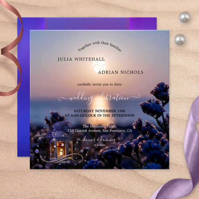 Sunset Coastal Winter Wedding Invitation (Wedding invitation featuring a sunset at the ocean with a lantern with sparkling lights)
