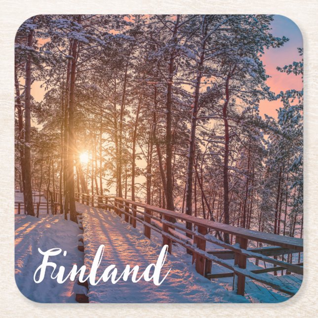 Sunset in snowy pine forest with sun ray square paper coaster (Front)