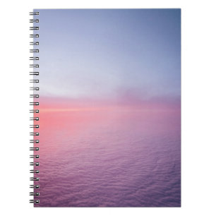 SUNSET ON A FLIGHT FROM HELSINKI FINNLAND TO FRANK NOTEBOOK