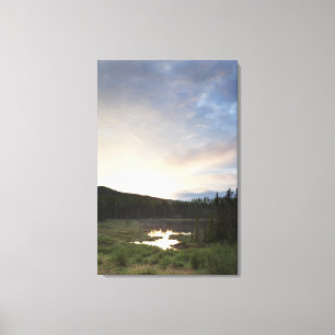 Sunset Over A Misty Pond Canvas Print