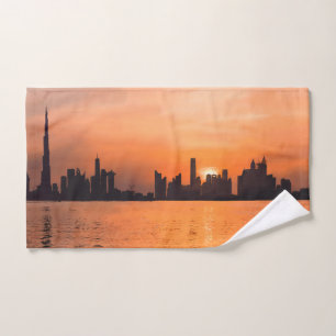 Sunset over a seaside town - watercolor hand towel