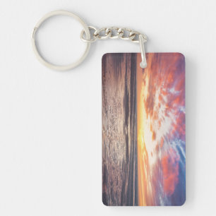 Sunset over beach and sea key ring