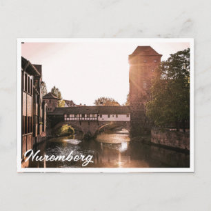 Sunset over mediaeval bridge in Nuremberg, Germany Postcard