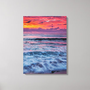 Sunset over ocean waves, California Canvas Print
