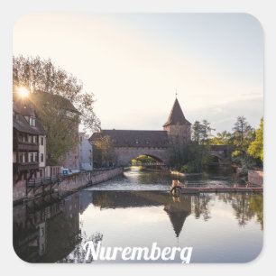 Sunset over old medieval bridge in Nuremberg Square Sticker