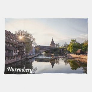 Sunset over old medieval bridge in Nuremberg Tea Towel