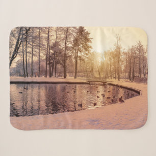 Sunset over park with small frosty lake sherpa blanket