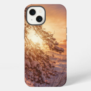 Sunset over sea and snowy pine tree iPhone 13 case