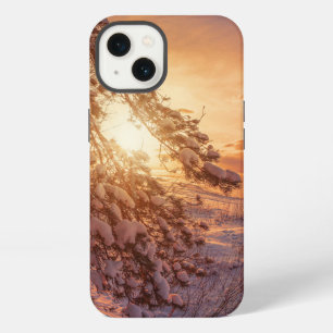 Sunset over sea and snowy pine tree iPhone 13 case
