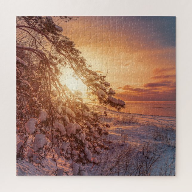 Sunset over sea and snowy pine tree jigsaw puzzle (Vertical)