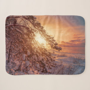 Sunset over sea and snowy pine tree sherpa blanket