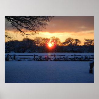 Sunset over snow field poster