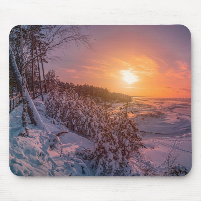 Sunset over snow sea coast mouse pad (Front)