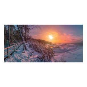 Sunset over snow sea coast photo print