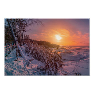 Sunset over snow sea coast poster