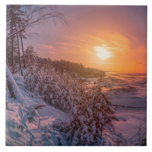 Sunset over snow sea coast tile