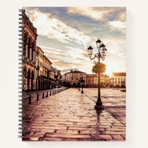 Sunset over square in Padova in Italy Notebook