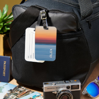Sunset Over Still Ocean – Dark Sea and Red Sky Luggage Tag